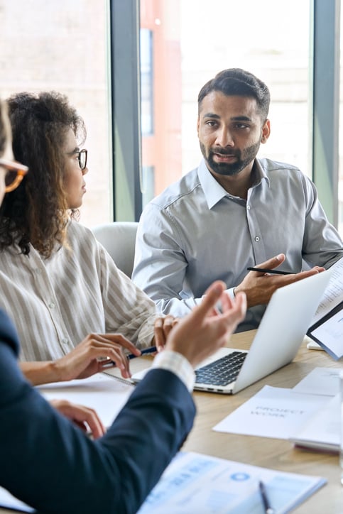 People_Around_table_iStock-1334472367
